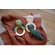 Crochet rattle on wooden ring, dragon